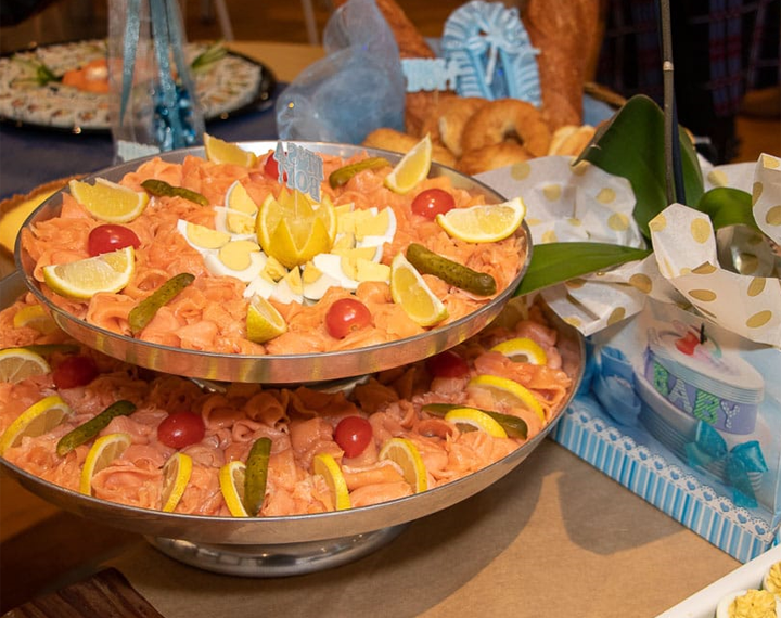  A large double tiered bowl of smoked salmon 