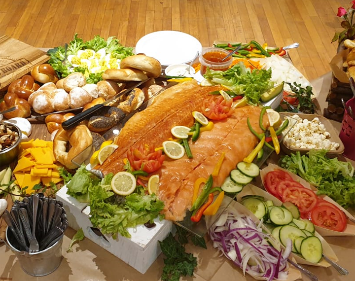  Kosher Jewish harvest table with salad, bread and salmon 